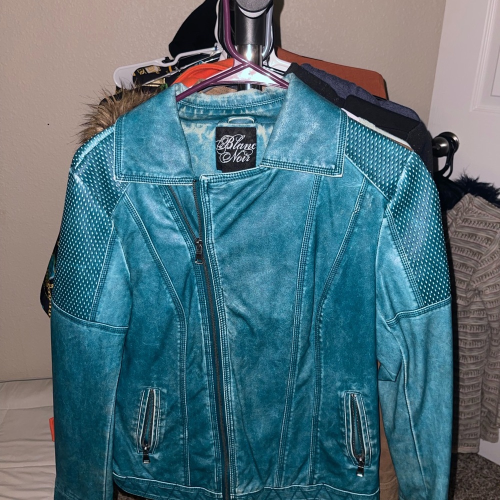 Turquoise vegan leather jacket.